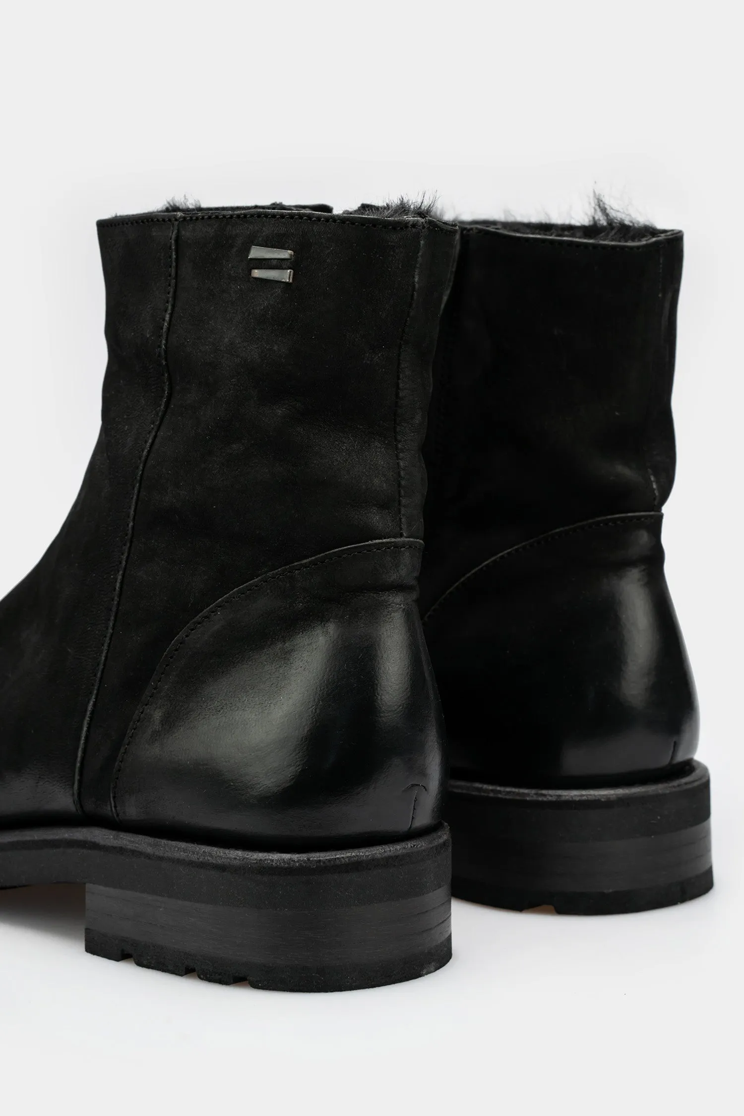 Shearling side zip boots